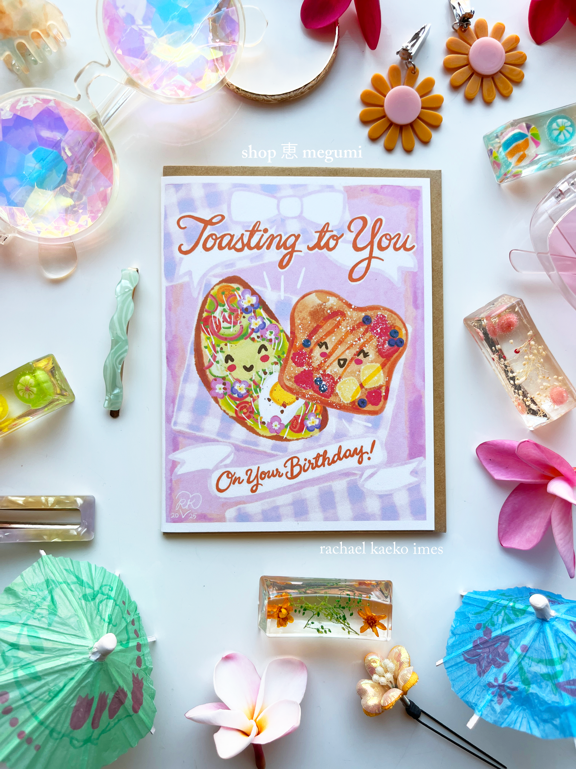 Cute coquette greeting card with a french toast and avocado toast design surrounded by decorative items on a white background