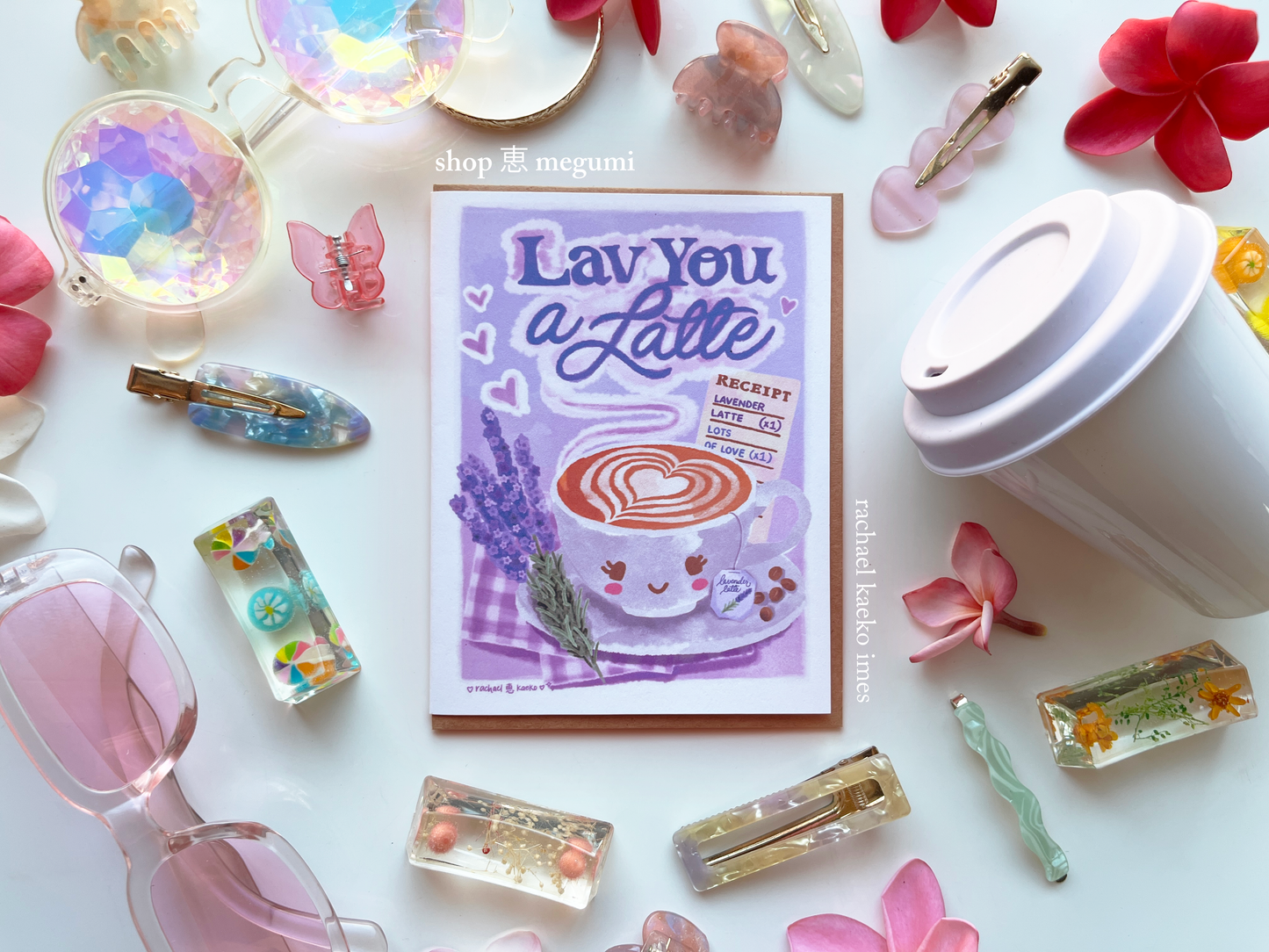 Kawaii greeting card with 'Lav You a Latte' design surrounded by decorative items on a white background.