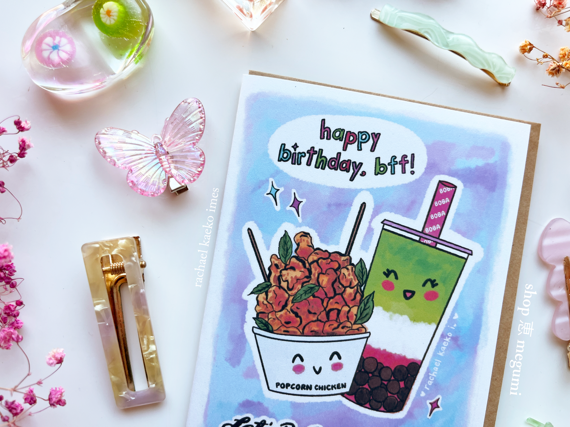 Kawaii boba birthday card with cartoon food illustrations and 'happy birthday, bff!' text on a decorative background.