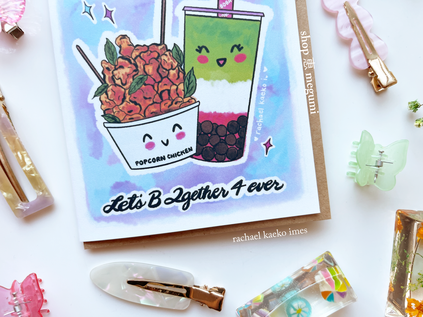 Cute boba greeting card with kawaii popcorn chicken and boba illustrations and text on a white background with decorative items.